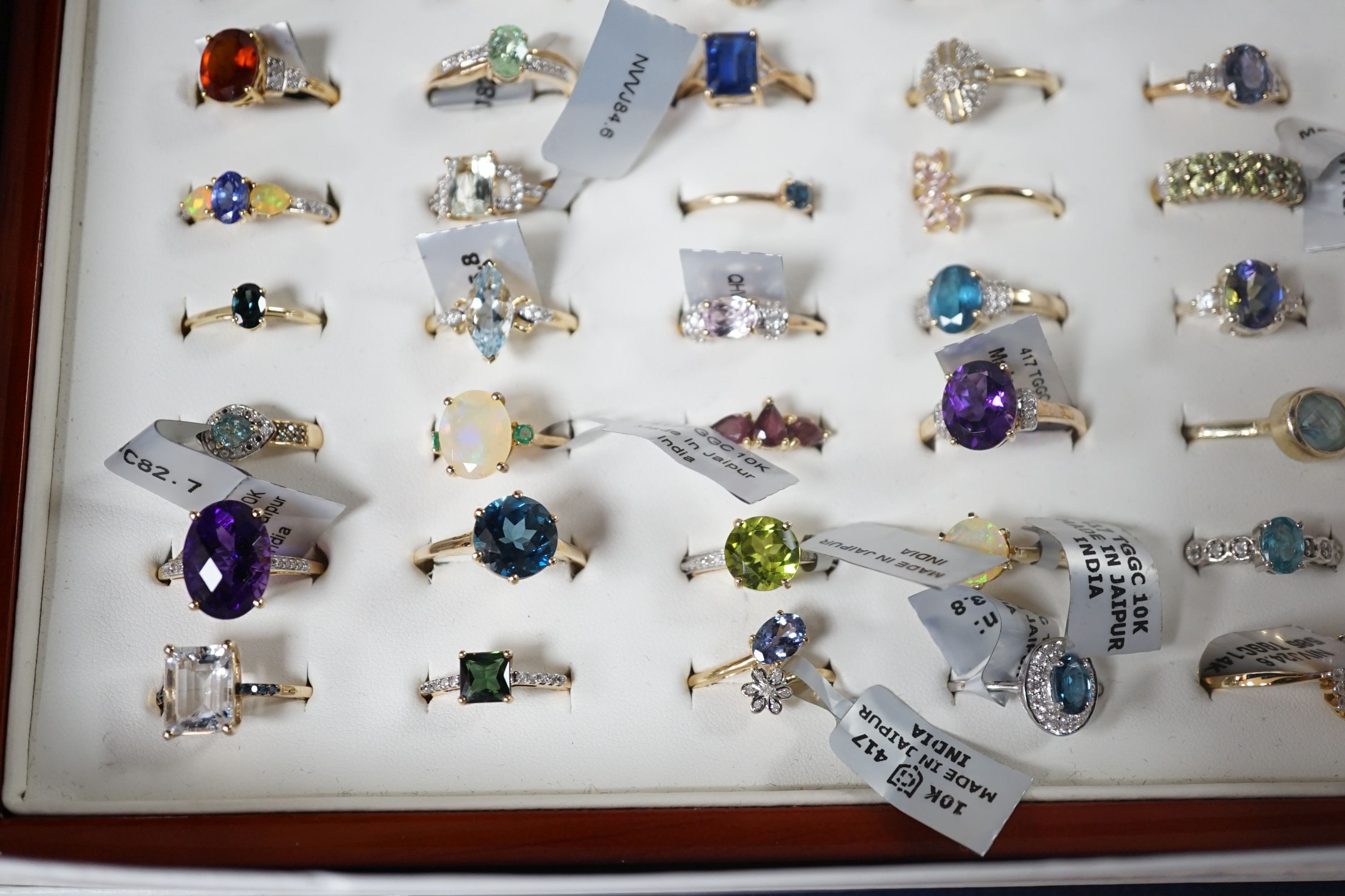 A collection of forty five assorted 9ct gold and gem set rings, including opal, emerald and amethyst, one 14ct gold and gem set ring and four 925 rings.